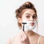 women shaving face